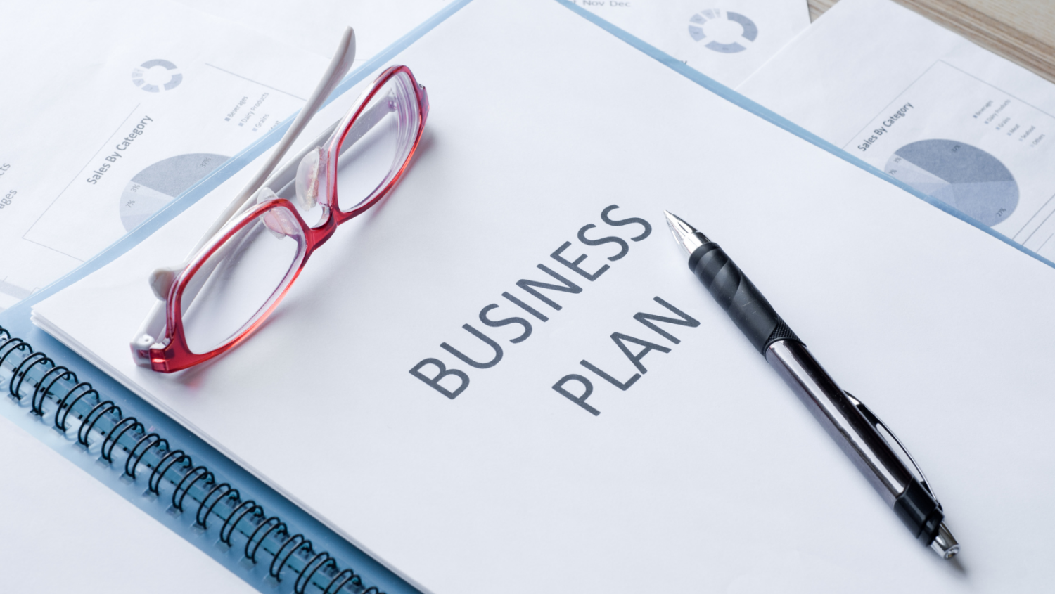 business-plan-doc-red-glasses-pen