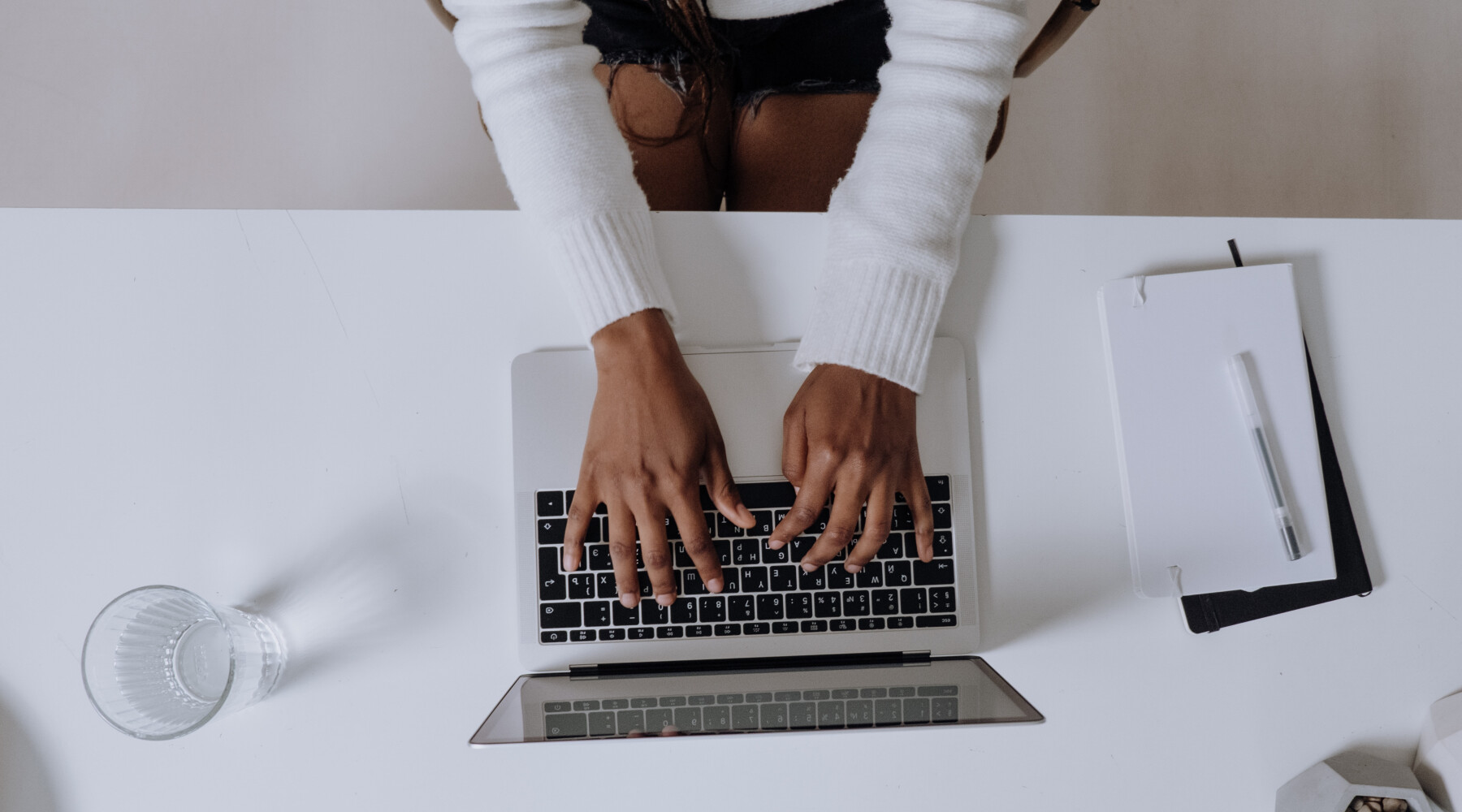 Woman on laptop taking an NDIS course