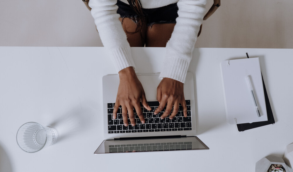 Woman on laptop taking an NDIS course